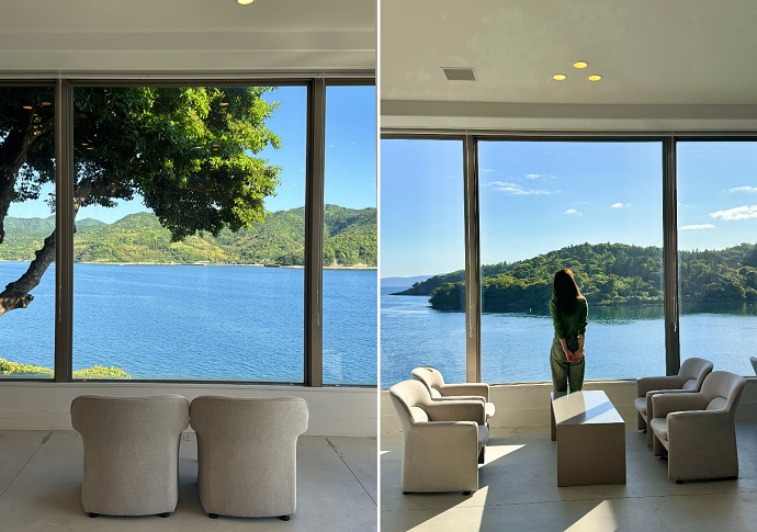 大きな窓から目の前の海と島の緑を眺められるロビー空間