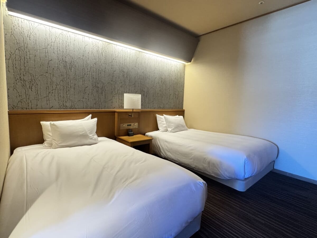 ラフォーレ伊東「温泉付プレミアムルーム」ベッド